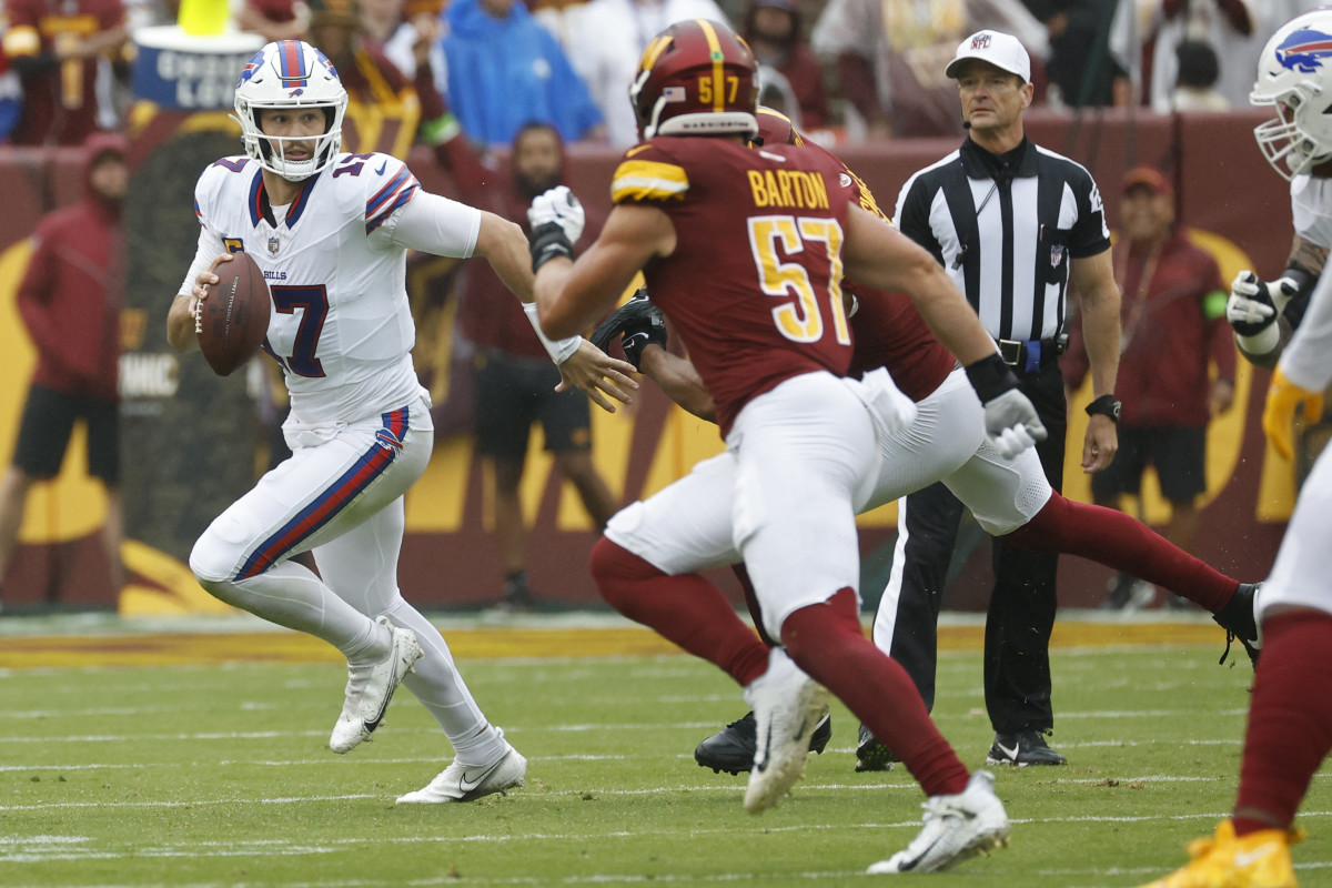 Buffalo Bills quarterback Josh Allen running against the Washington Commanders.
